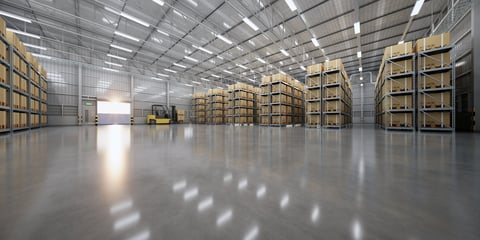 Modern warehouse interior with organized storage and concrete epoxy floor